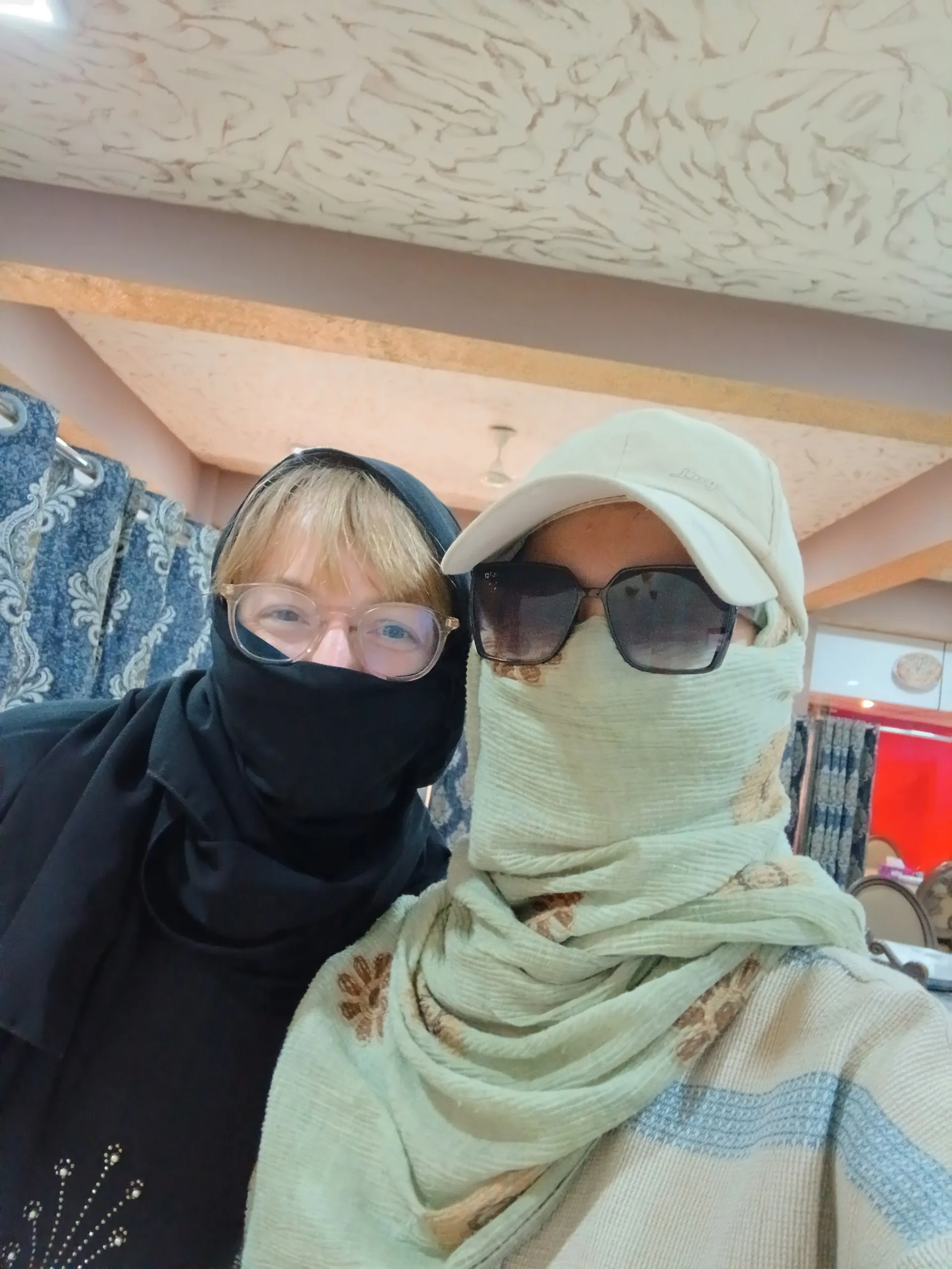 In Kandahar during our research trip — a quiet moment in a local restaurant while planning future women-only tours together.