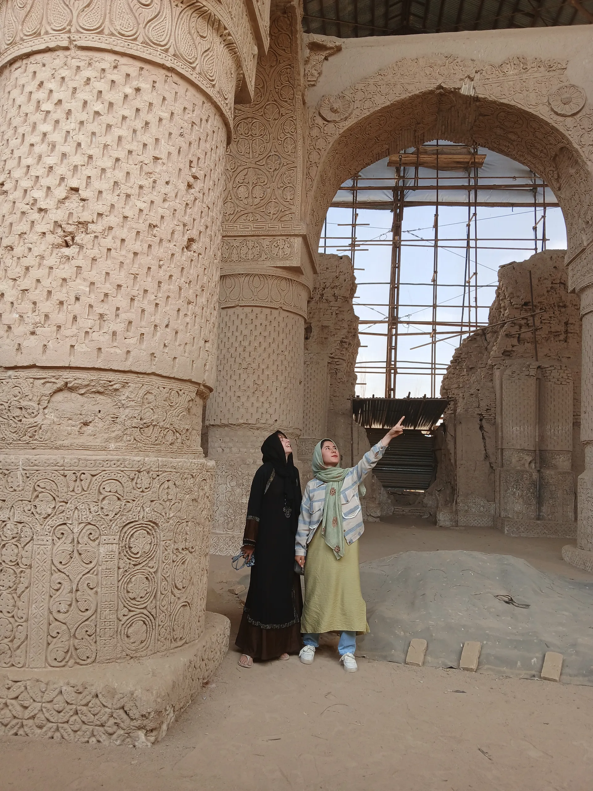 At the Nine Domes Mosque in Balkh — sharing the history of this remarkable site during our research and planning journey.