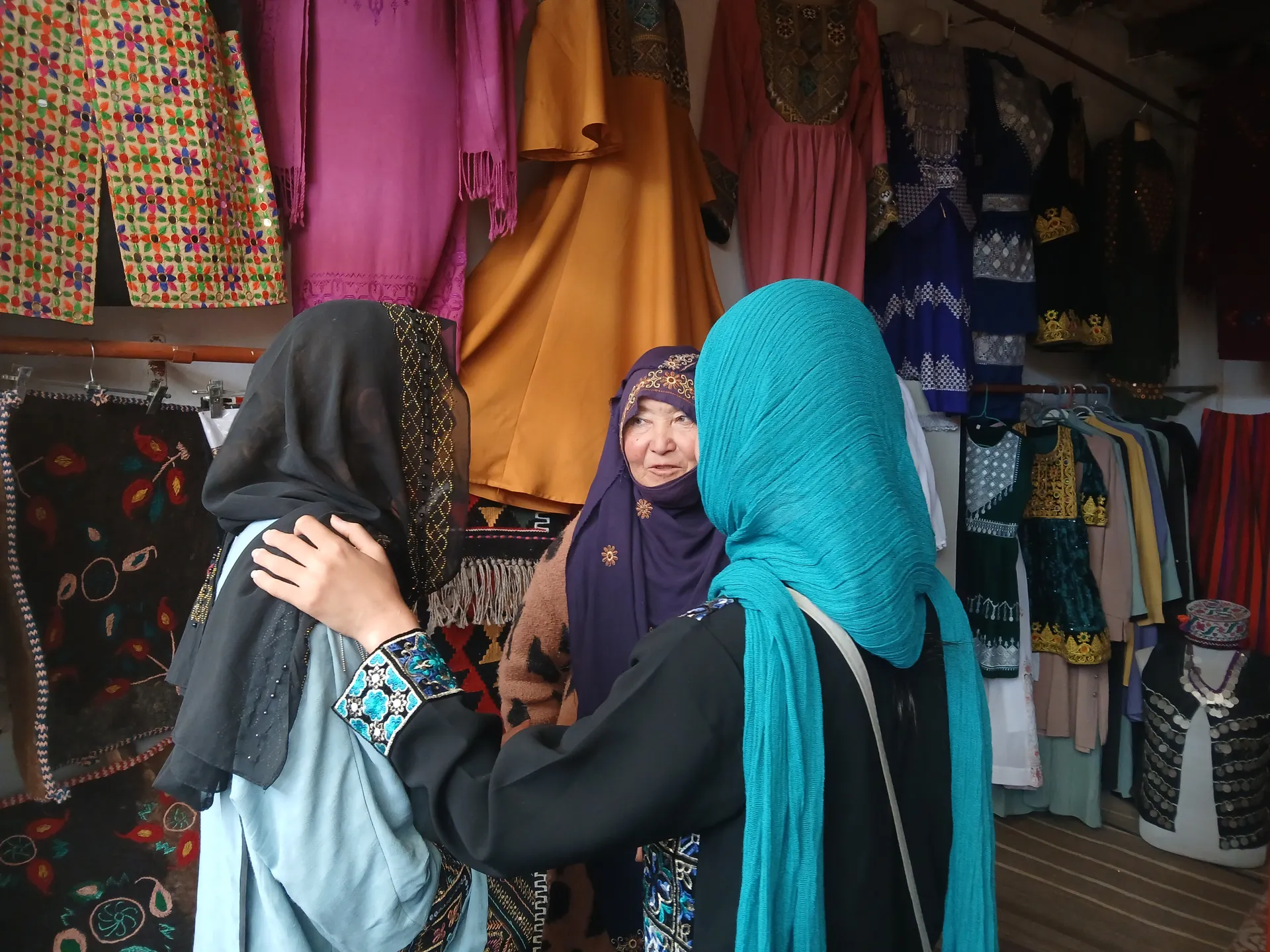 In Bamiyan, sharing a conversation with the manager of the Women’s Art Bazaar during our research and planning trip.